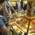 Isobel has a go at the coin push thing, A "Minimoon" and an Adnams Brewery Trip, Southwold, Suffolk - 7th July 2010