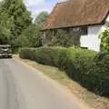 The Jeep heads past Dr. Vickery's house, Clive and Suzanne's Wedding, Oakley and Brome, Suffolk - 10th July 2010