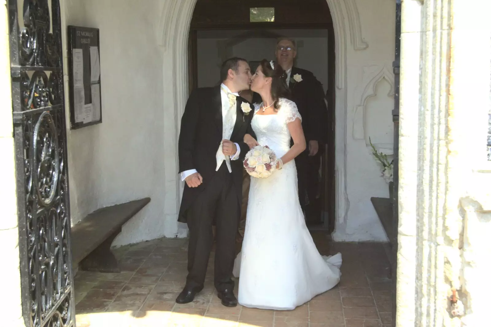 A kiss in the porch, from Clive and Suzanne's Wedding, Oakley and Brome, Suffolk - 10th July 2010