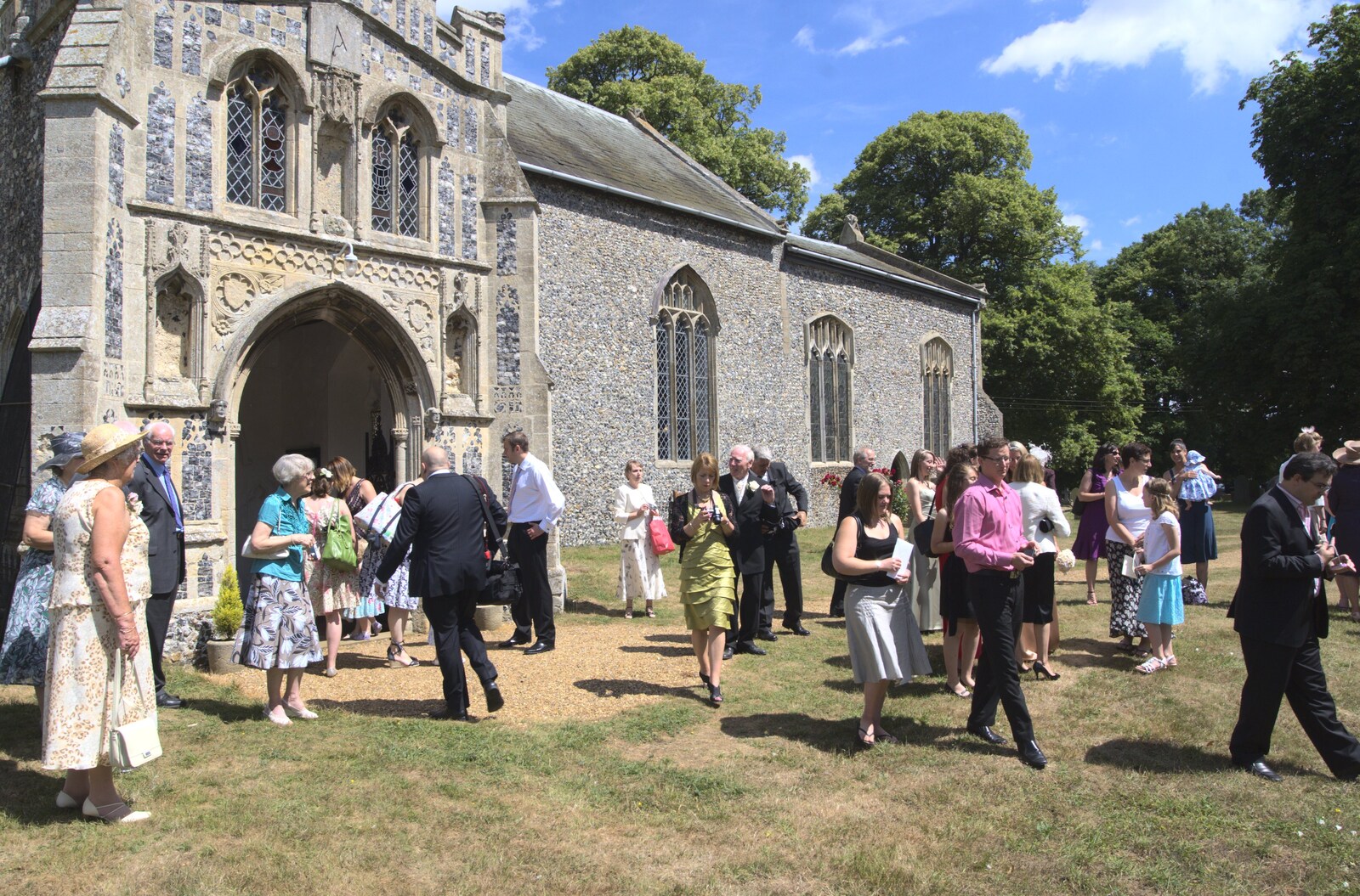 Crowds outside the church from Clive and Suzanne's Wedding, Oakley and Brome, Suffolk - 10th July 2010