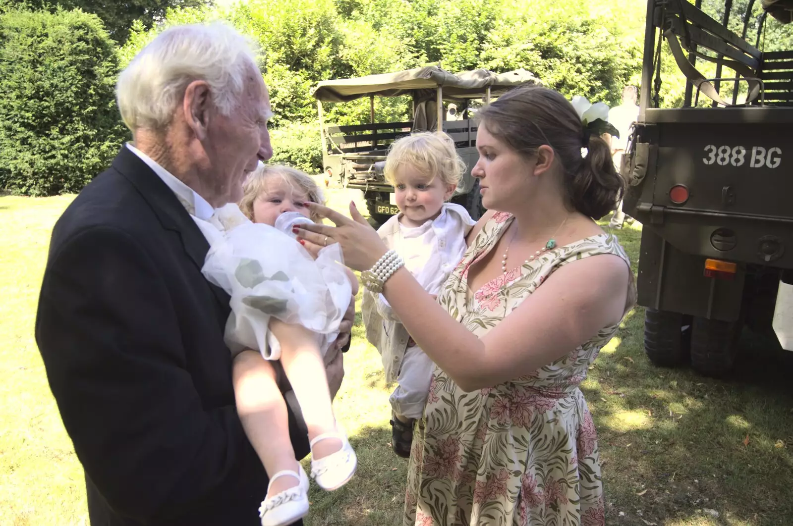 Isobel meets another baby, from Clive and Suzanne's Wedding, Oakley and Brome, Suffolk - 10th July 2010