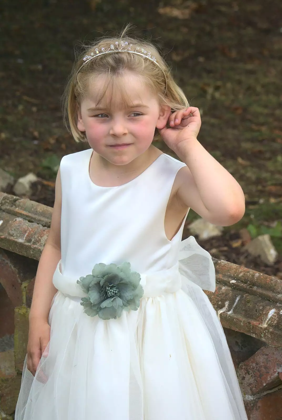 The bridesmaid scratches her ear, from Clive and Suzanne's Wedding, Oakley and Brome, Suffolk - 10th July 2010