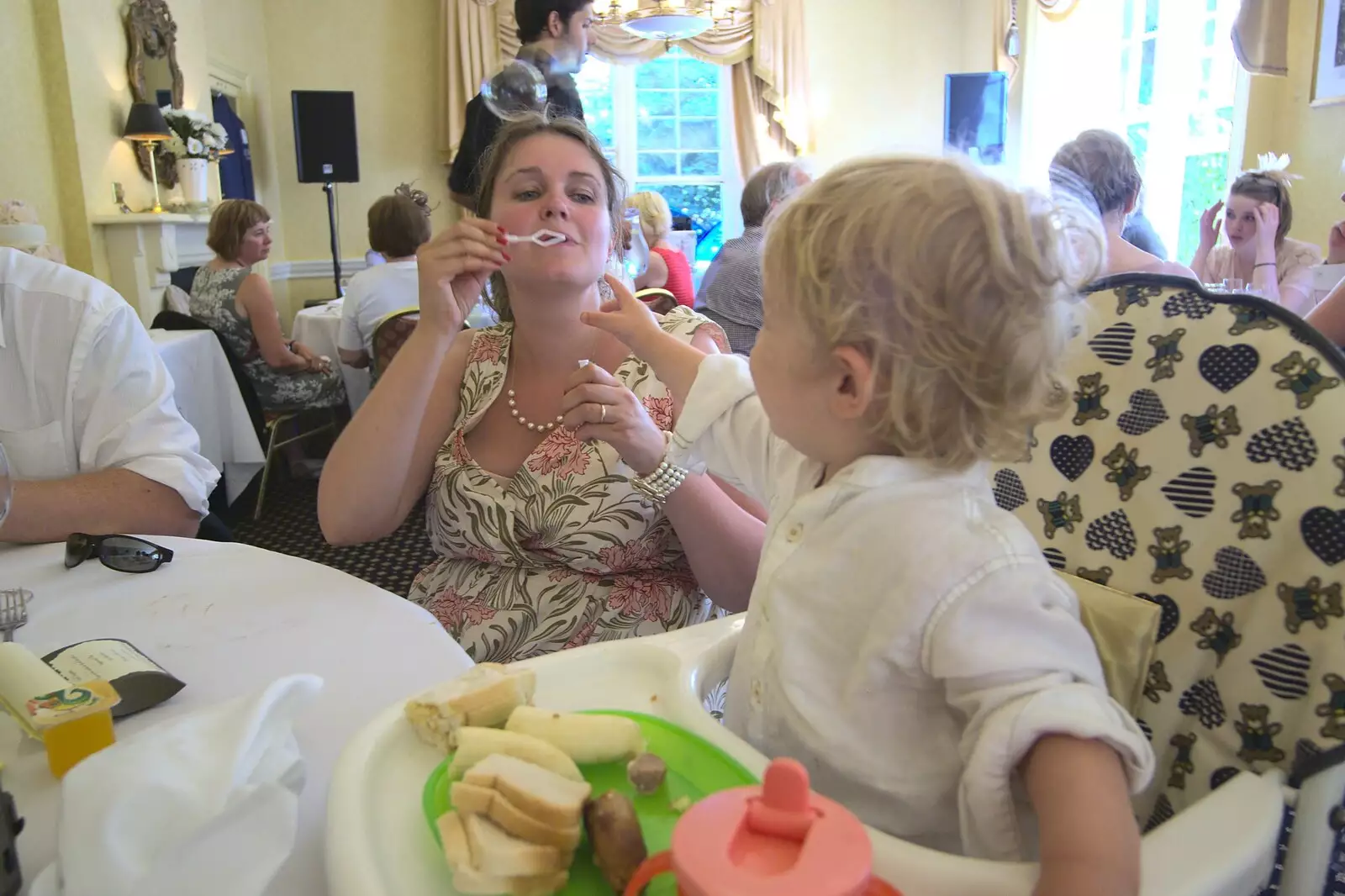 Isobel blows bubbles for Fred, from Clive and Suzanne's Wedding, Oakley and Brome, Suffolk - 10th July 2010