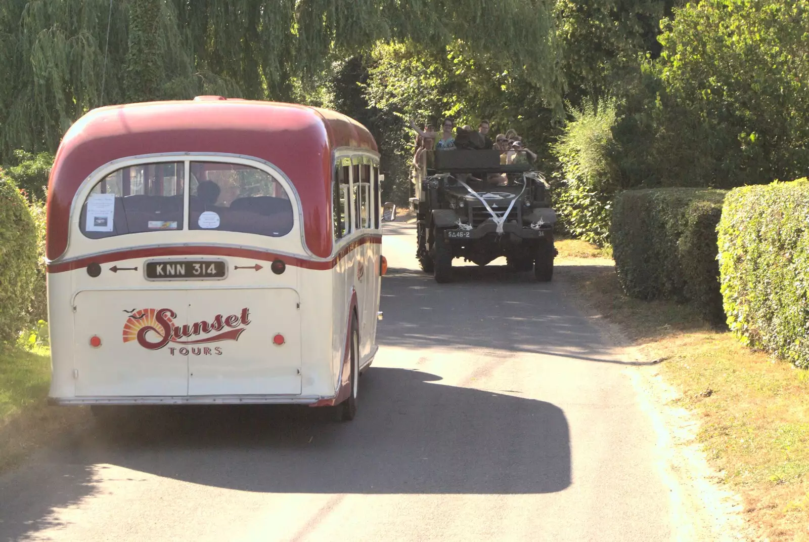 The bus and half-track squeeze past each other, from Clive and Suzanne's Wedding, Oakley and Brome, Suffolk - 10th July 2010