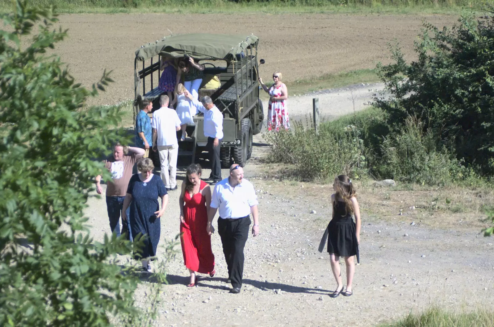 Guests on foot, from Clive and Suzanne's Wedding, Oakley and Brome, Suffolk - 10th July 2010