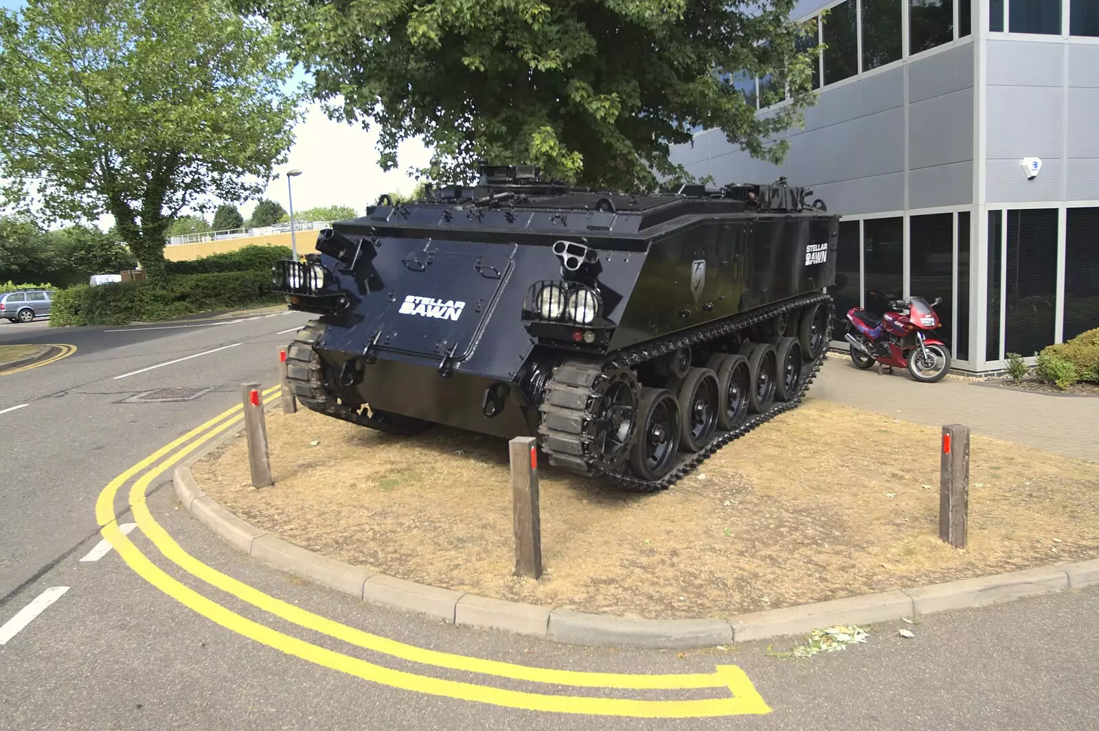 An armoured personnel carrier appears outside the office, from The Fifth Latitude Festival, Henham Park, Suffolk - 16th July 2010