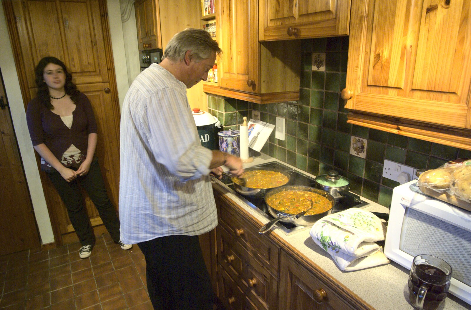 Nigel and Gail's Anniversary Bash, Thrandeston Great Green, Suffolk - 24th July 2010: In the kitchen, Nigel does his thing with curry