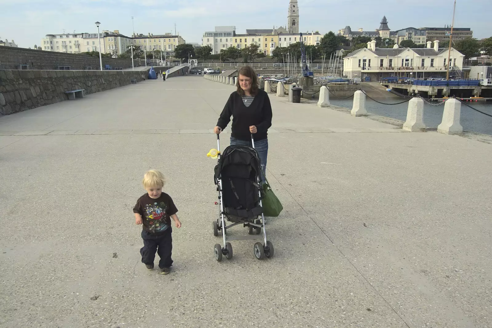 Fred and Isobel walk along the harbour wall, from A Day in Dun Laoghaire, County Dublin, Ireland - 3rd September 2010