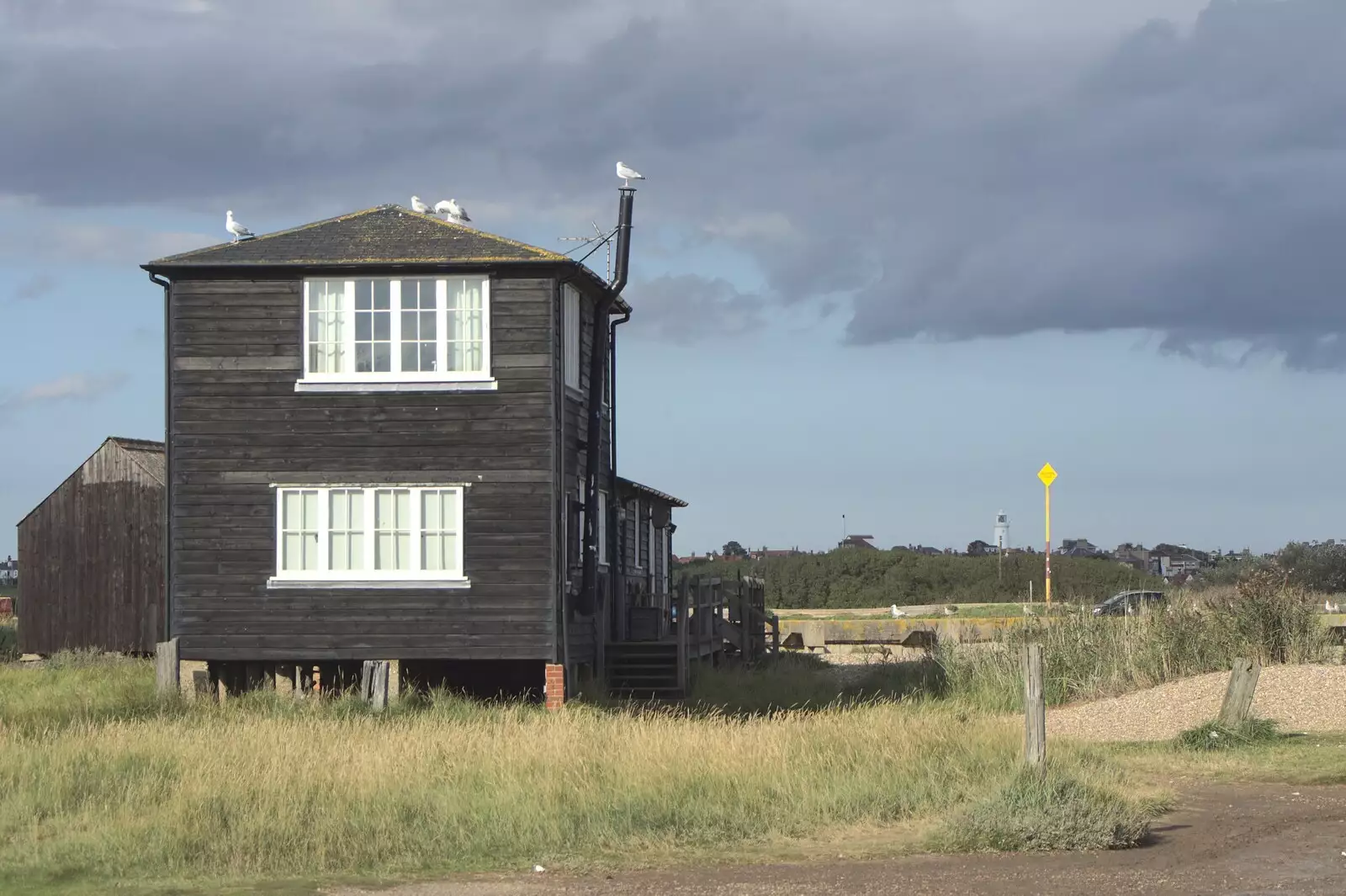 Dark clouds and a house on stilts, from A Trip to Walberswick, Suffolk - 12th September 2010