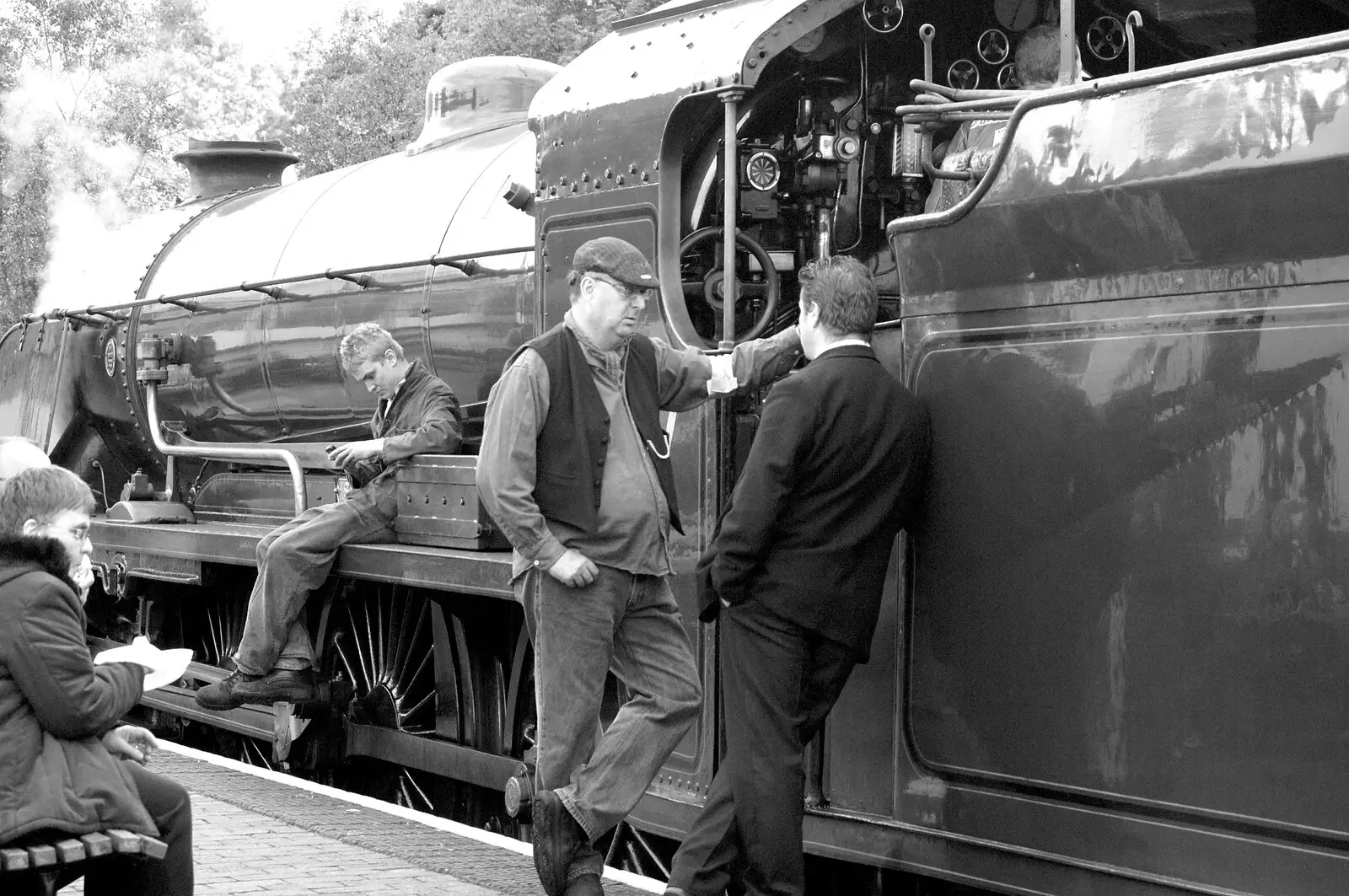 The engine driver chats to someone, from A 1940s Steam Weekend, Holt and Sheringham, Norfolk - 18th September 2010