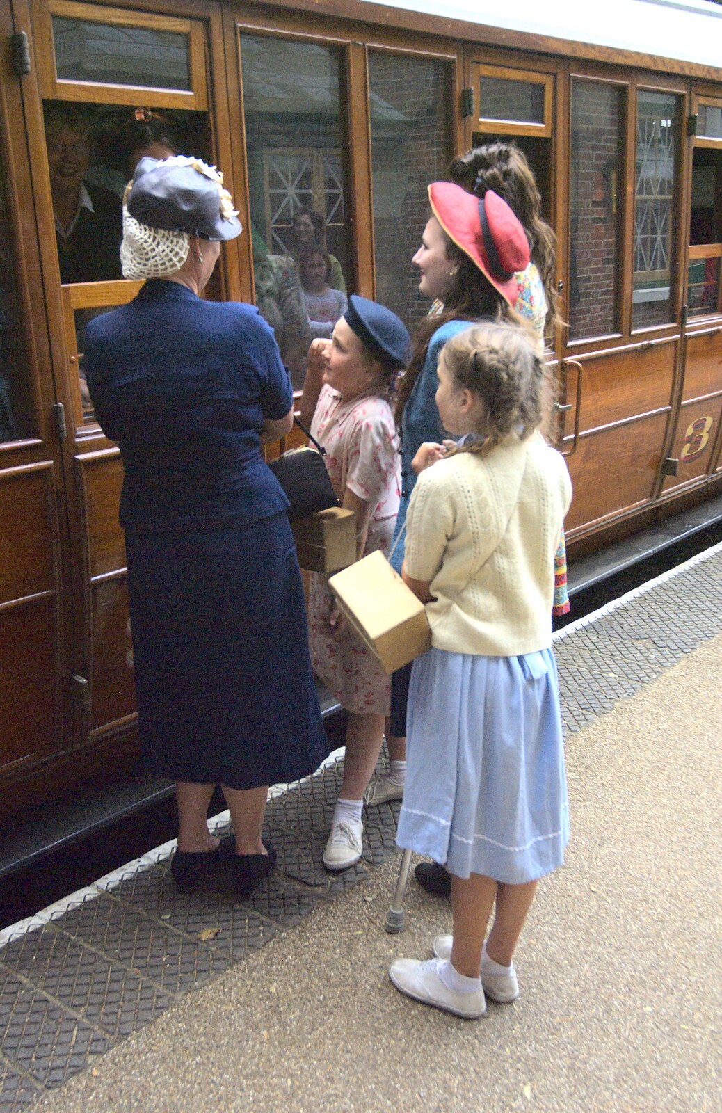 Evacuee girls on the platforn from A 1940s Steam Weekend, Holt and Sheringham, Norfolk - 18th September 2010