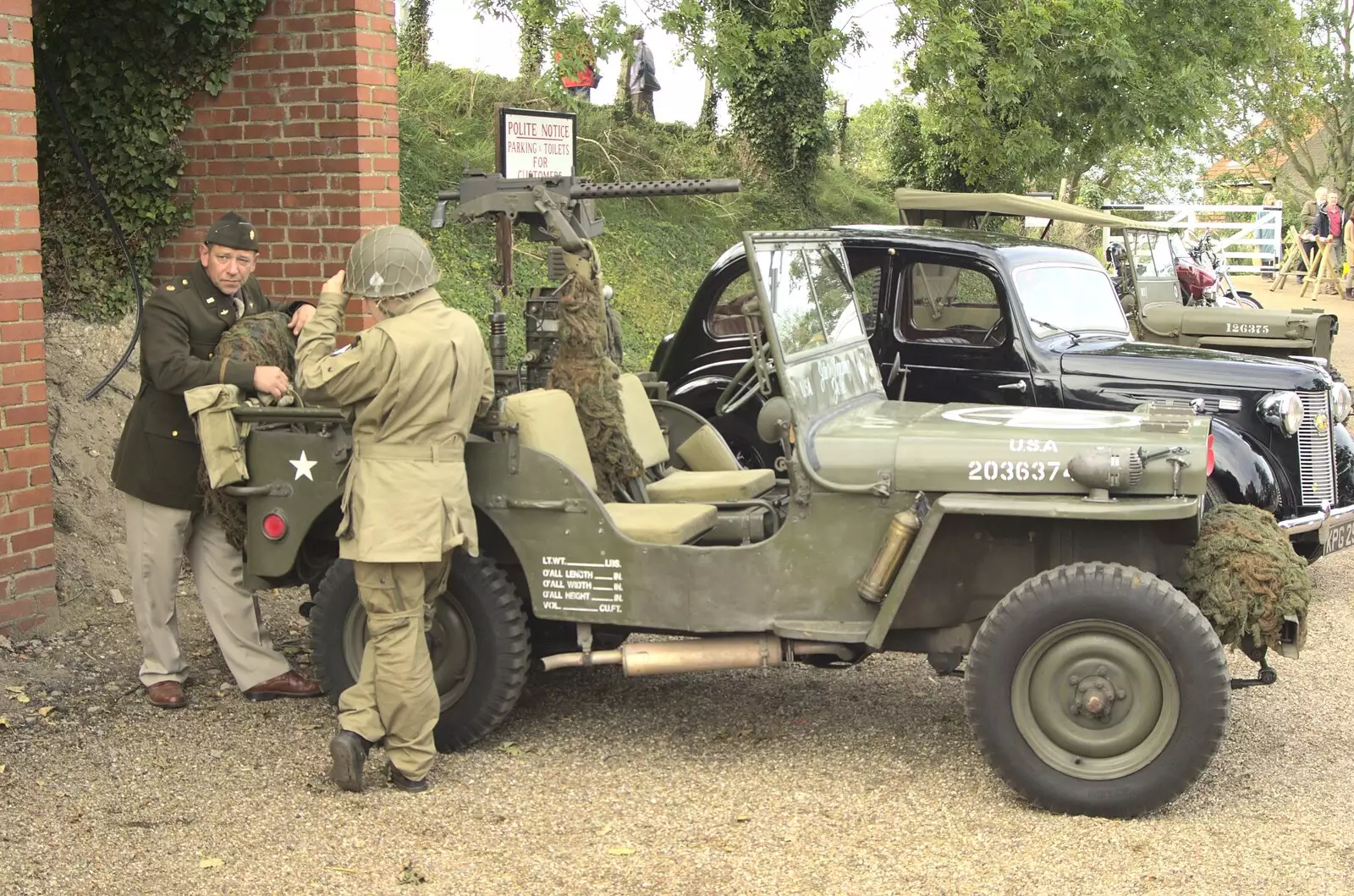 Hanging out by a Willy's jeep, from A 1940s Steam Weekend, Holt and Sheringham, Norfolk - 18th September 2010