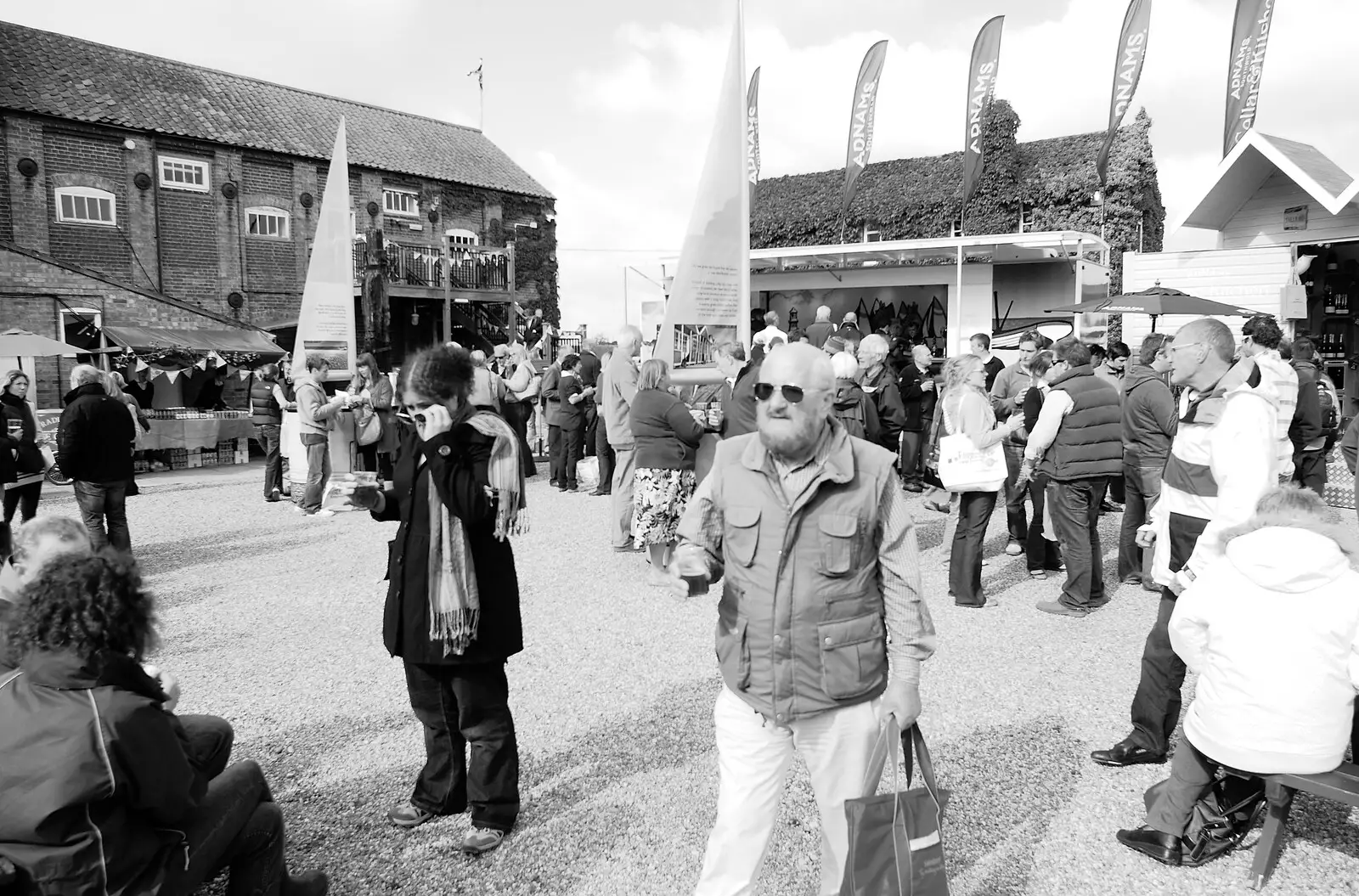 People with beer mill around, from The Aldeburgh Food Festival, Snape Maltings, Suffolk - 25th September 2010