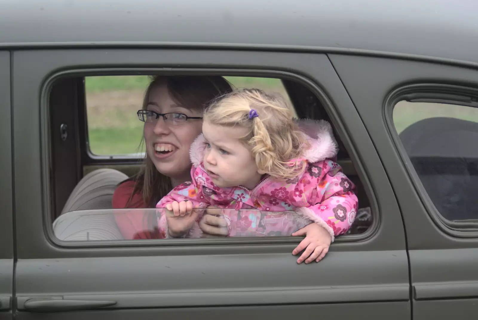 Ellie and Amelia in the back of the car, from A Bit of Ploughs to Propellors, Rougham Airfield, Suffolk - 3rd October 2010