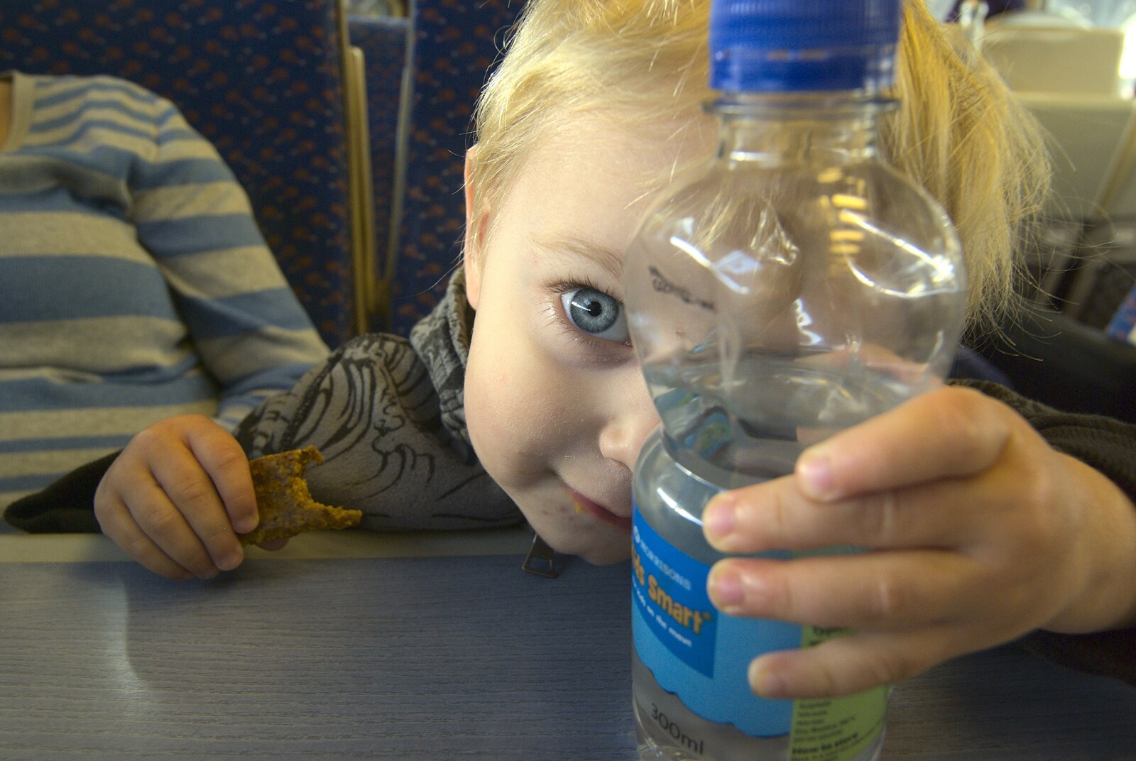 Norwich By Train, Norfolk - 16th October 2010: Fred looks through a bottle of water
