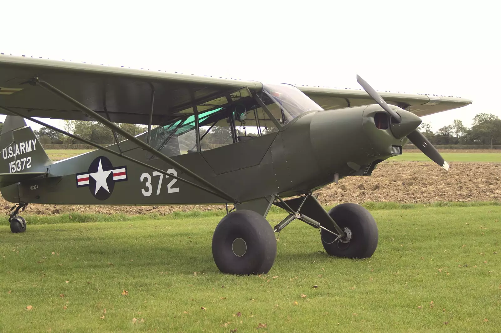 A US Army observation plane with fat wheels, from Maurice Mustang's Open Day, Hardwick Airfield, Norfolk - 17th October 2010