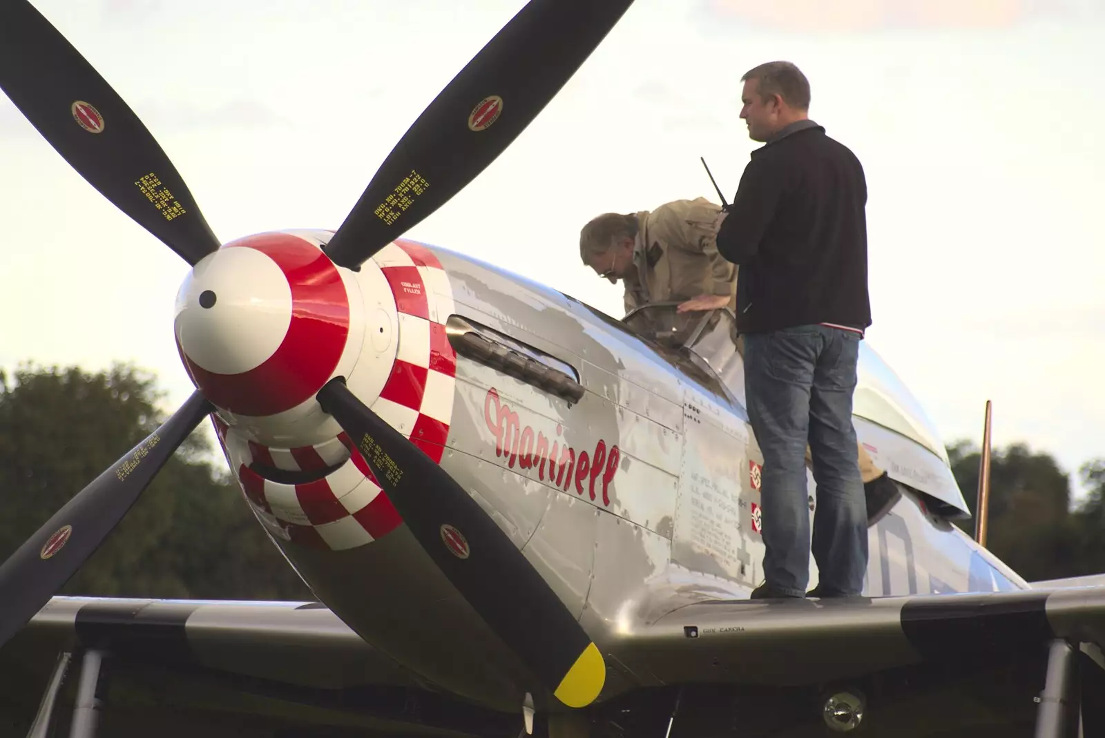 Maurice climbs in to Marinell, from Maurice Mustang's Open Day, Hardwick Airfield, Norfolk - 17th October 2010