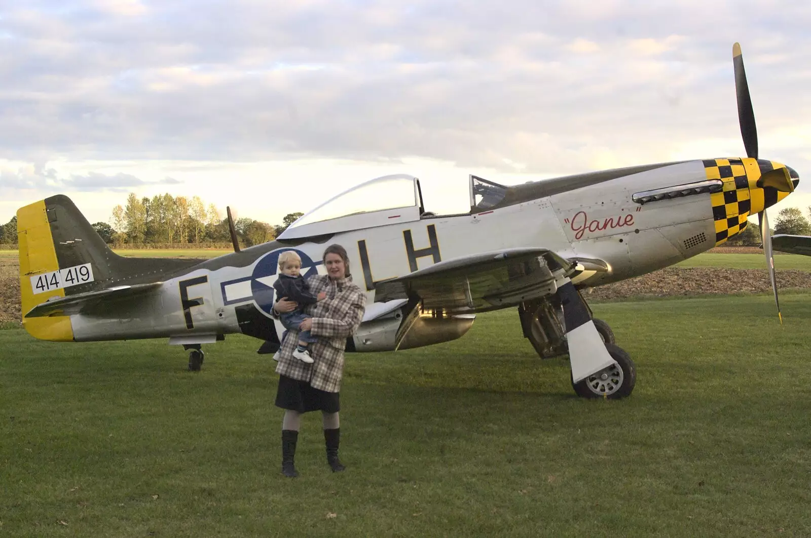 Isobel and Fred in front of Janie, from Maurice Mustang's Open Day, Hardwick Airfield, Norfolk - 17th October 2010