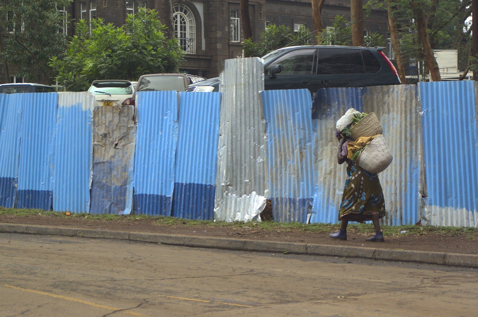 A woman hauls along a load from Nairobi and the Road to Maasai Mara, Kenya, Africa - 1st November 2010