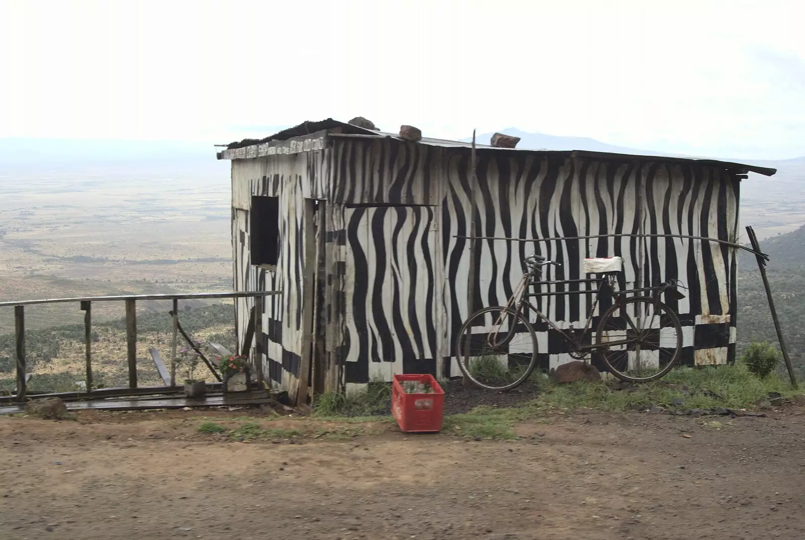 A zebra-striped hut looks out over the Rift Valley, from Nairobi and the Road to Maasai Mara, Kenya, Africa - 1st November 2010