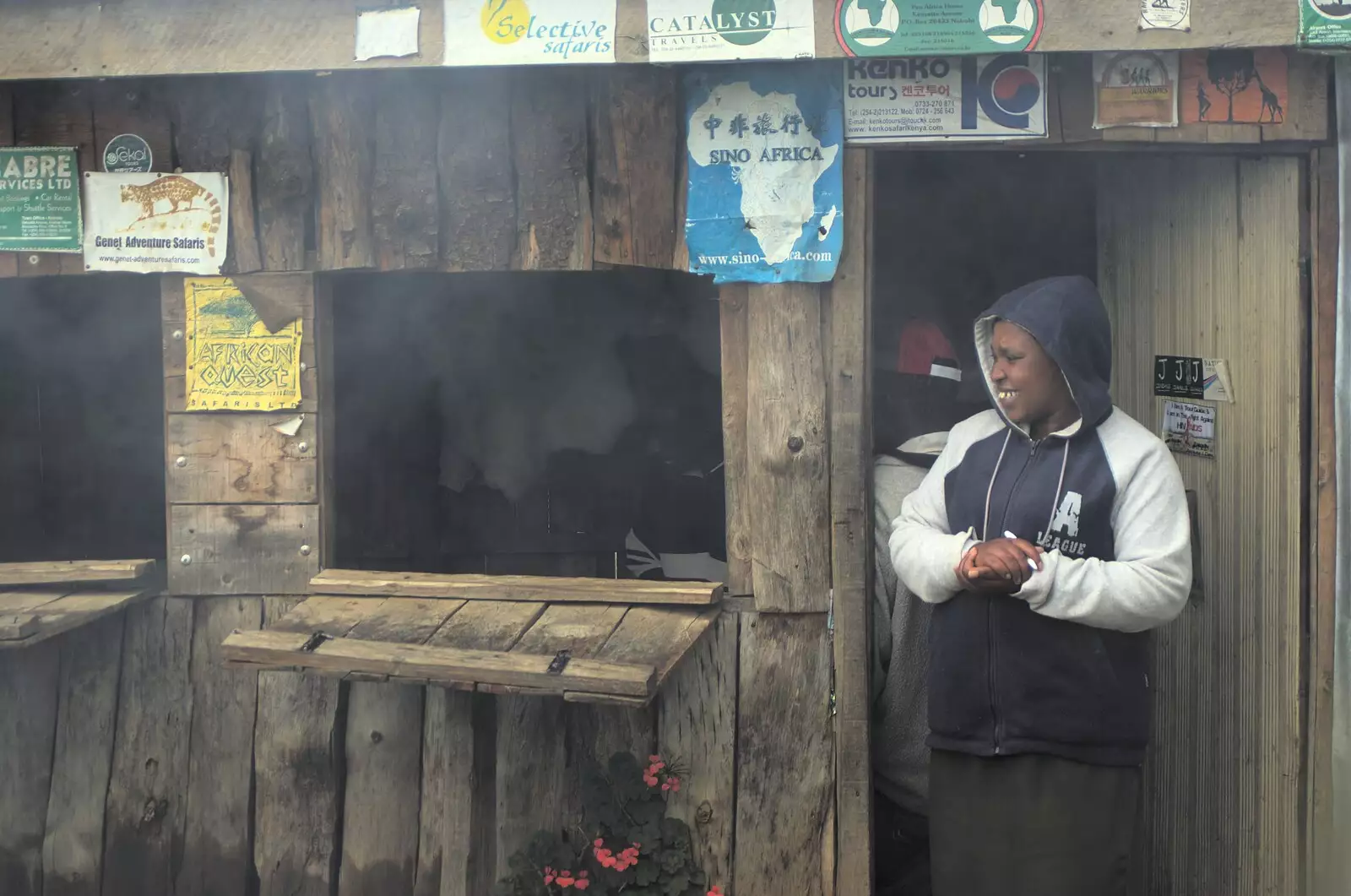 A woman by the café door, from Nairobi and the Road to Maasai Mara, Kenya, Africa - 1st November 2010