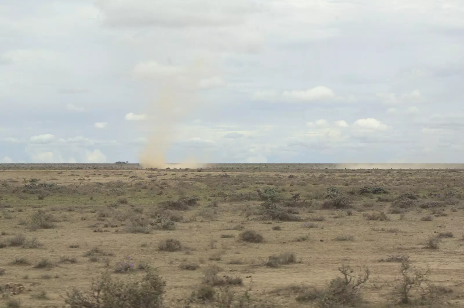 We spot some dust devils on the plains, from Maasai Mara Safari and a Maasai Village, Ololaimutia, Kenya - 5th November 2010