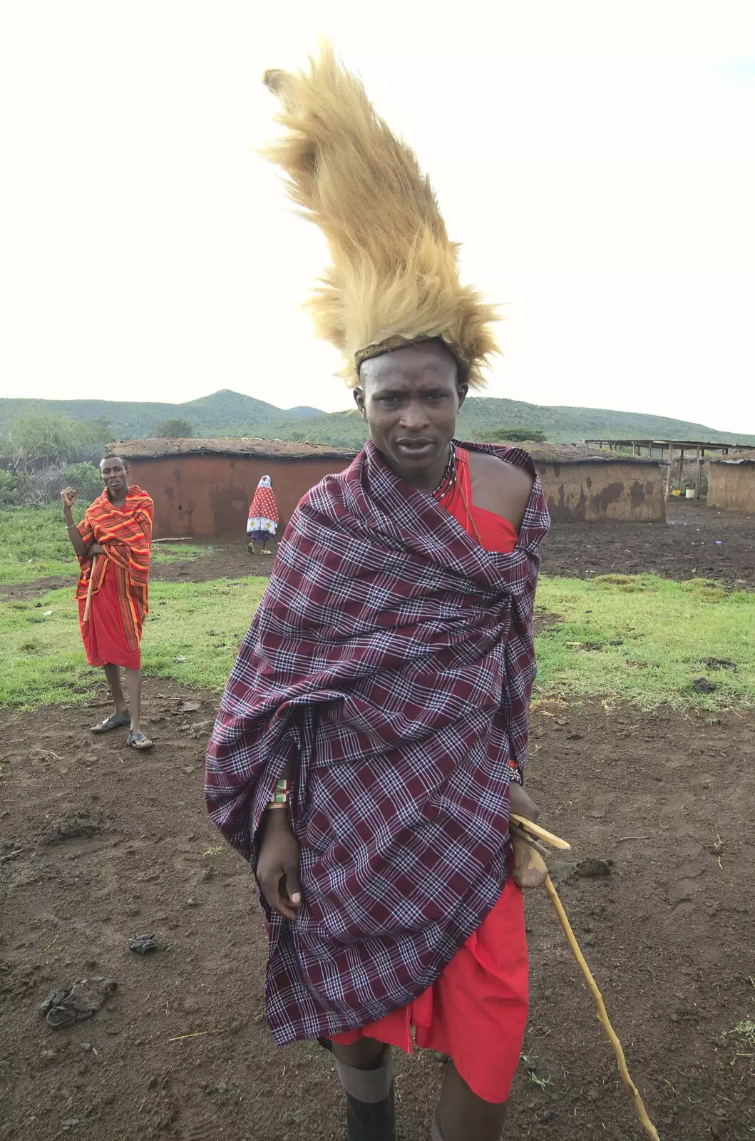 A lion-skin head-dress is part of the ritual, from Maasai Mara Safari and a Maasai Village, Ololaimutia, Kenya - 5th November 2010