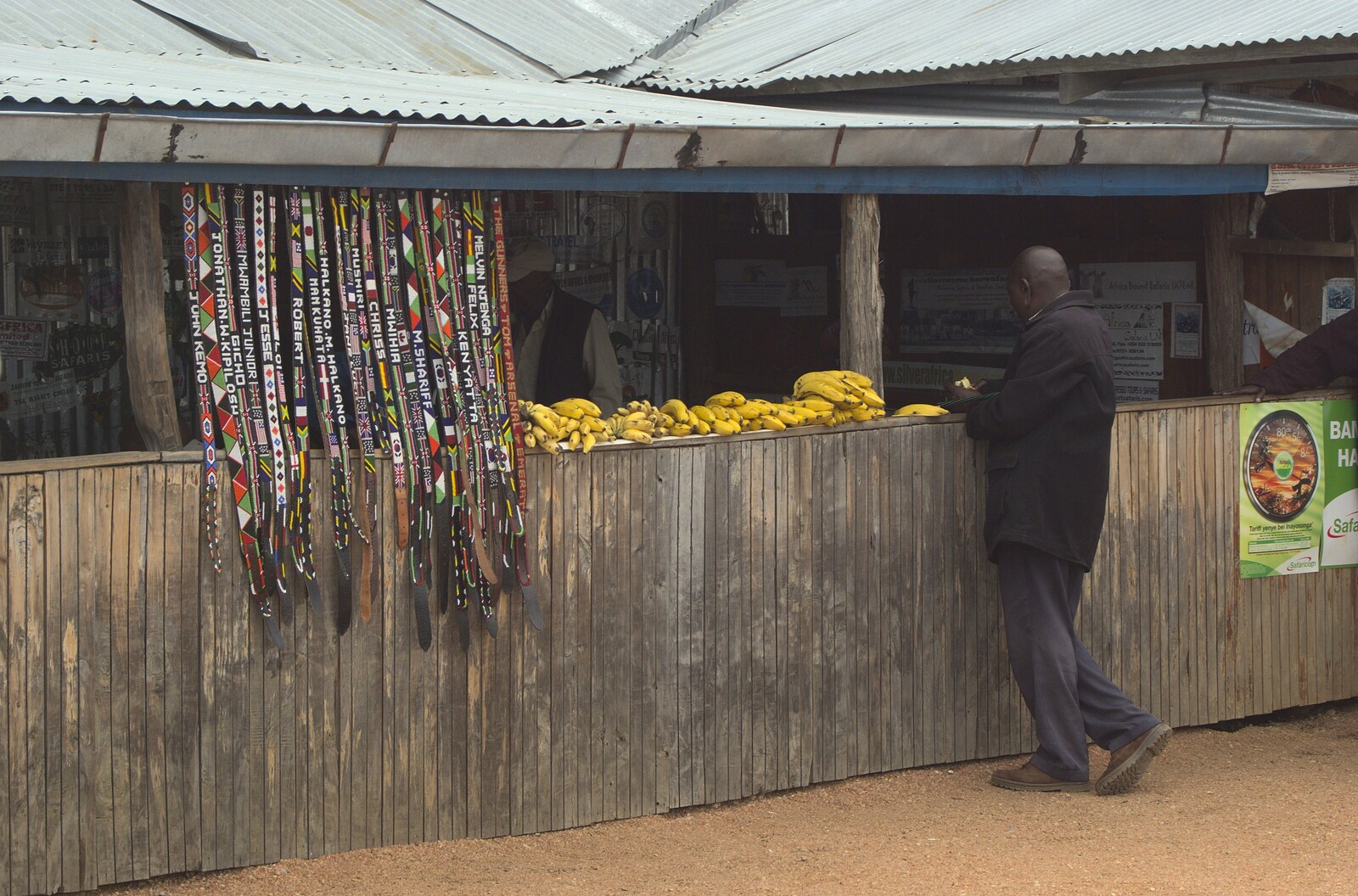 Narok to Naivasha and Hell's Gate National Park, Kenya, Africa - 5th November 2010: Souvenir belts, and bananas for sale