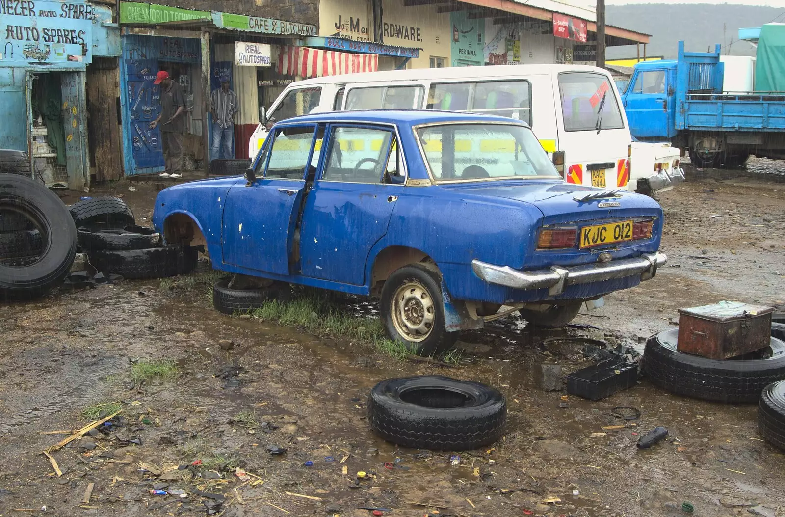 An ancient car sits on old tyres in Maai Mahiu, from Narok to Naivasha and Hell's Gate National Park, Kenya, Africa - 5th November 2010