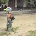 A woman with a bundle on her head, Long Train (not) Runnin': Tiwi Beach, Mombasa, Kenya - 7th November 2010