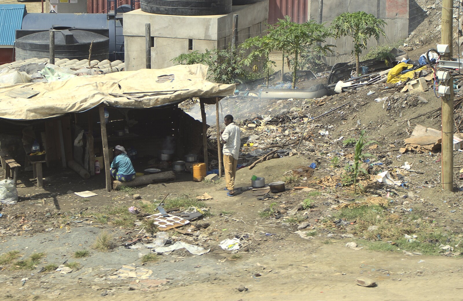 Long Train (not) Runnin': Tiwi Beach, Mombasa, Kenya - 7th November 2010: People are living on landfill outside Mombasa
