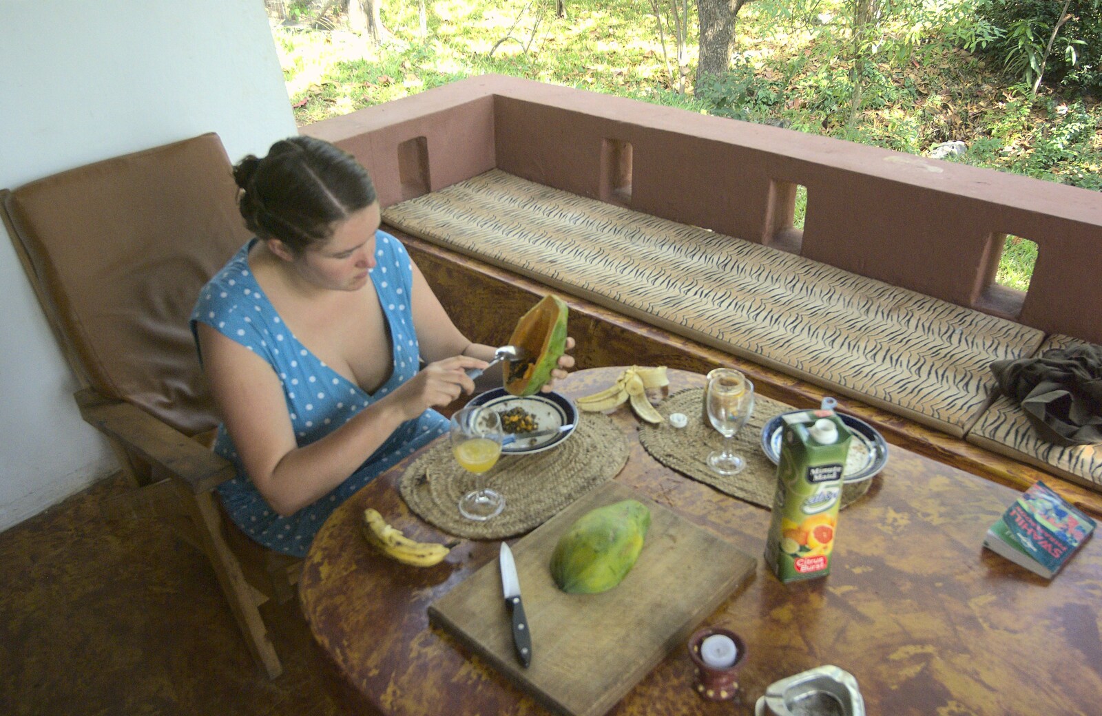 Long Train (not) Runnin': Tiwi Beach, Mombasa, Kenya - 7th November 2010: Isobel eats a mango for breakfast