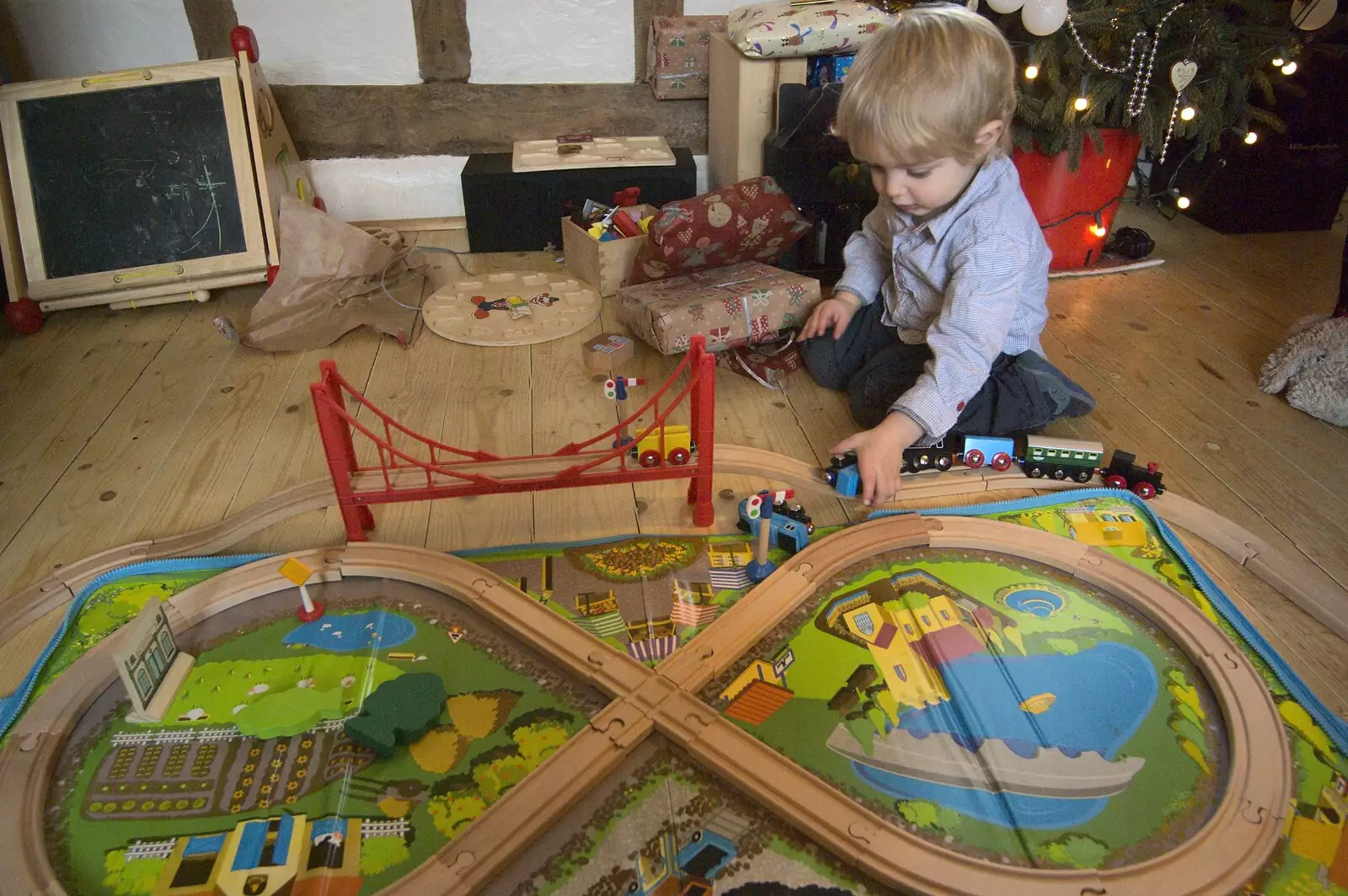 Fred plays with trains, from Christmas Day at the Swan Inn, and some Festive Trips, Brome, Knettishall and Norwich - 25th December 2010