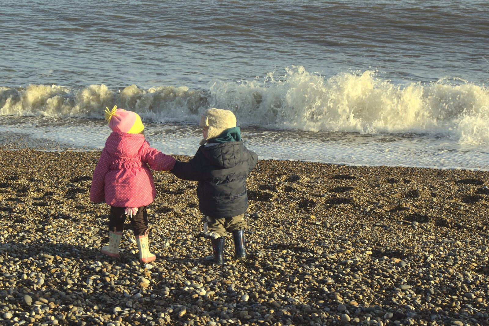 A Trip to Thorpeness, Suffolk - 9th January 2011: Amelia and Fred hold hands on the beach