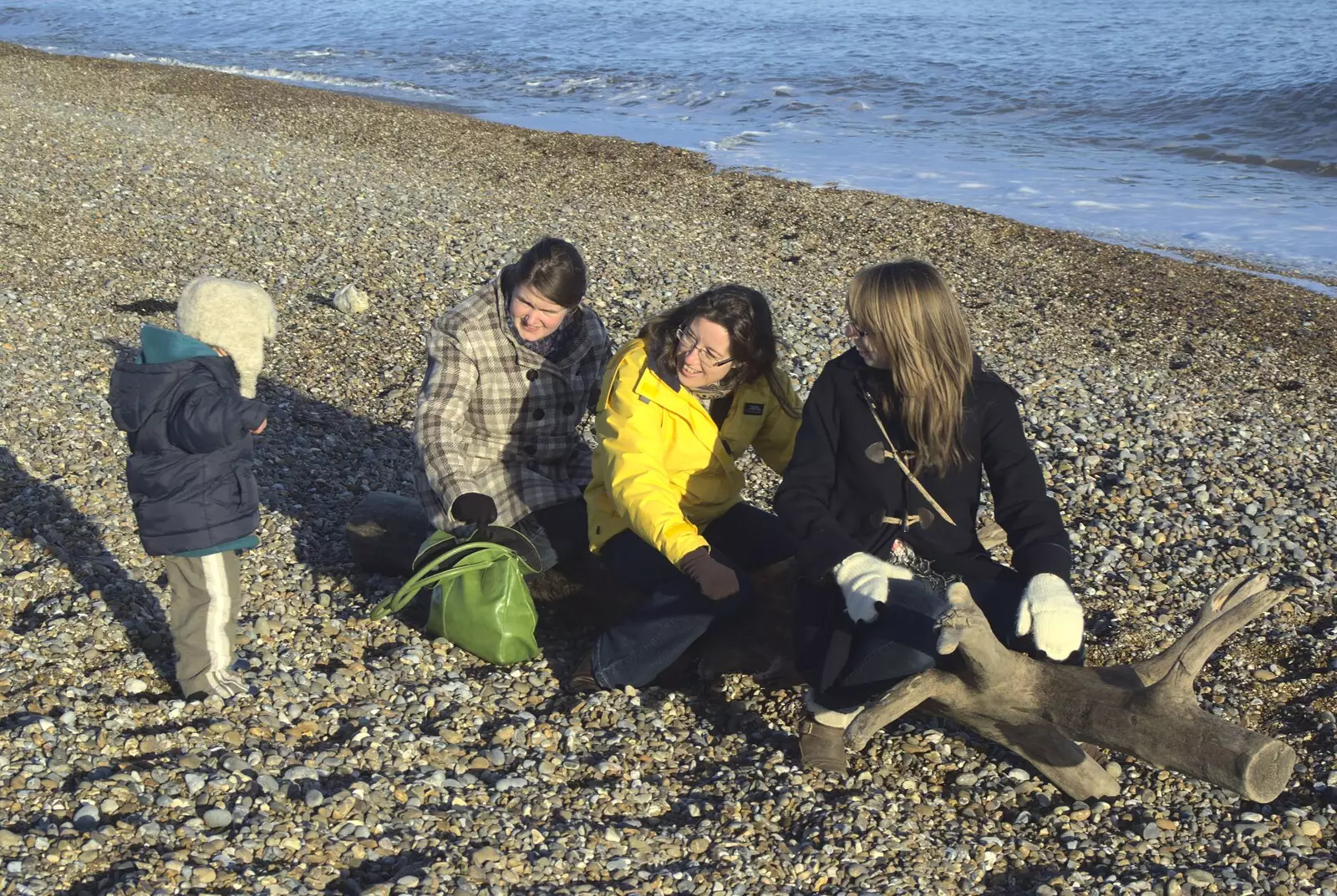 Isobel, Suzanne and Ellie are on the log, from A Trip to Thorpeness, Suffolk - 9th January 2011