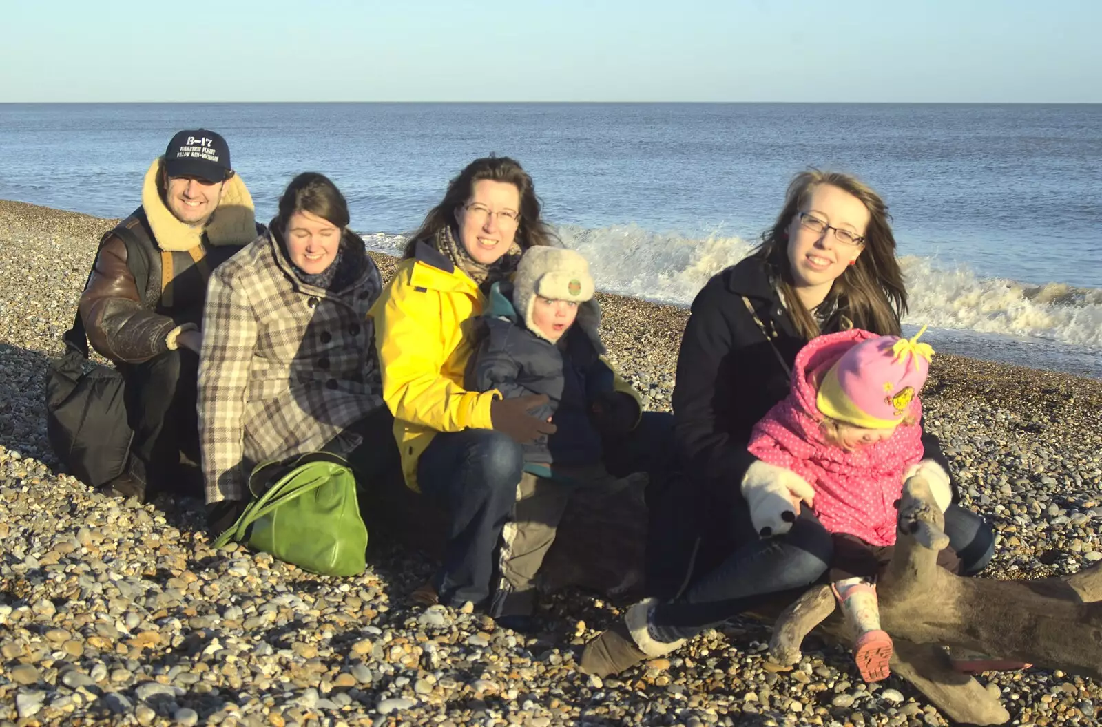 The whole gang on the driftwood log, from A Trip to Thorpeness, Suffolk - 9th January 2011