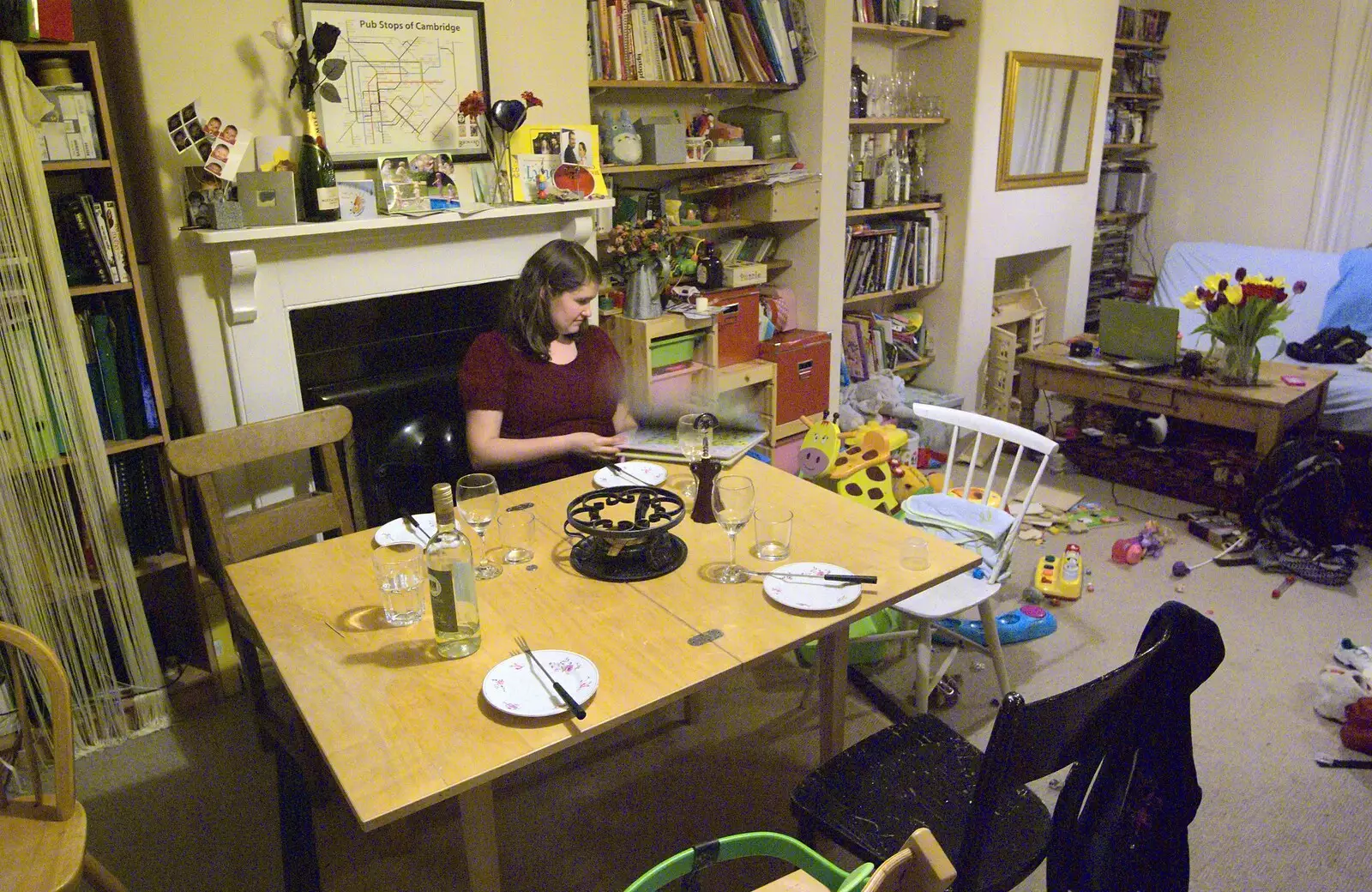 Isobel reads a book, from Thornham Walks, and a Swiss Fondue, Thornham and Cambridge - 23rd January 2011