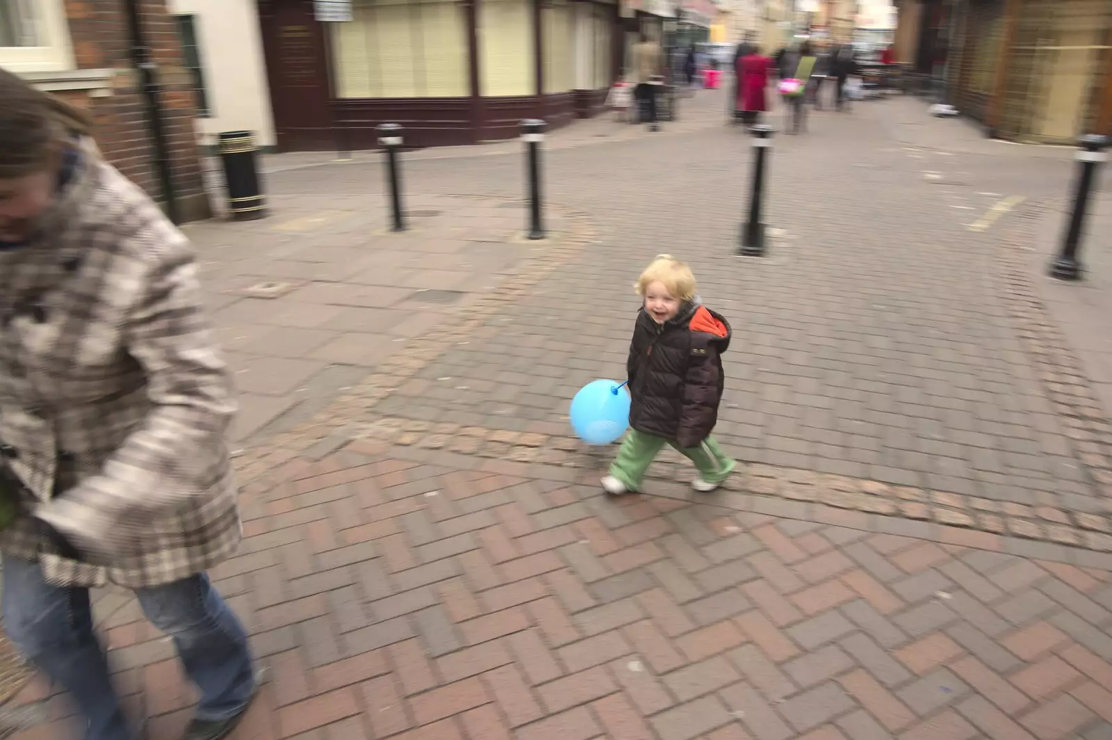 Fred chases Isobel with a balloon on a stick, from Pizza in Bury St. Edmunds, Suffolk - 30th January 2011