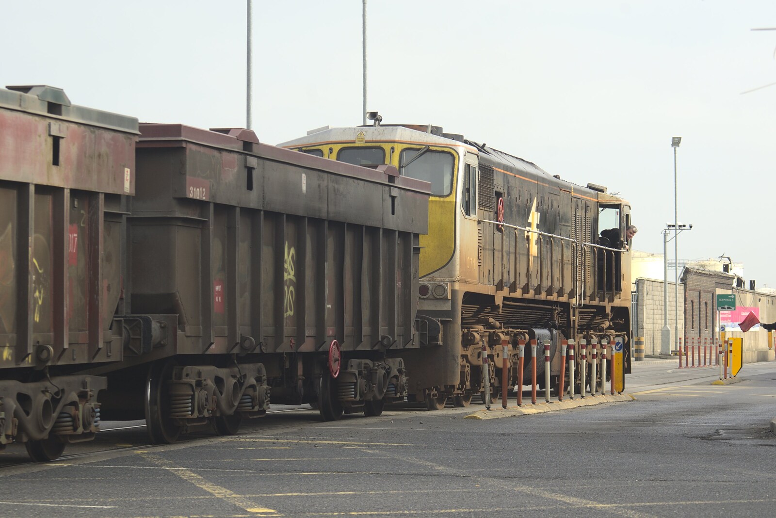 A CIE Class 141 loco rumbles across East Wall Road from A Week in Monkstown, County Dublin, Ireland - 1st March 2011