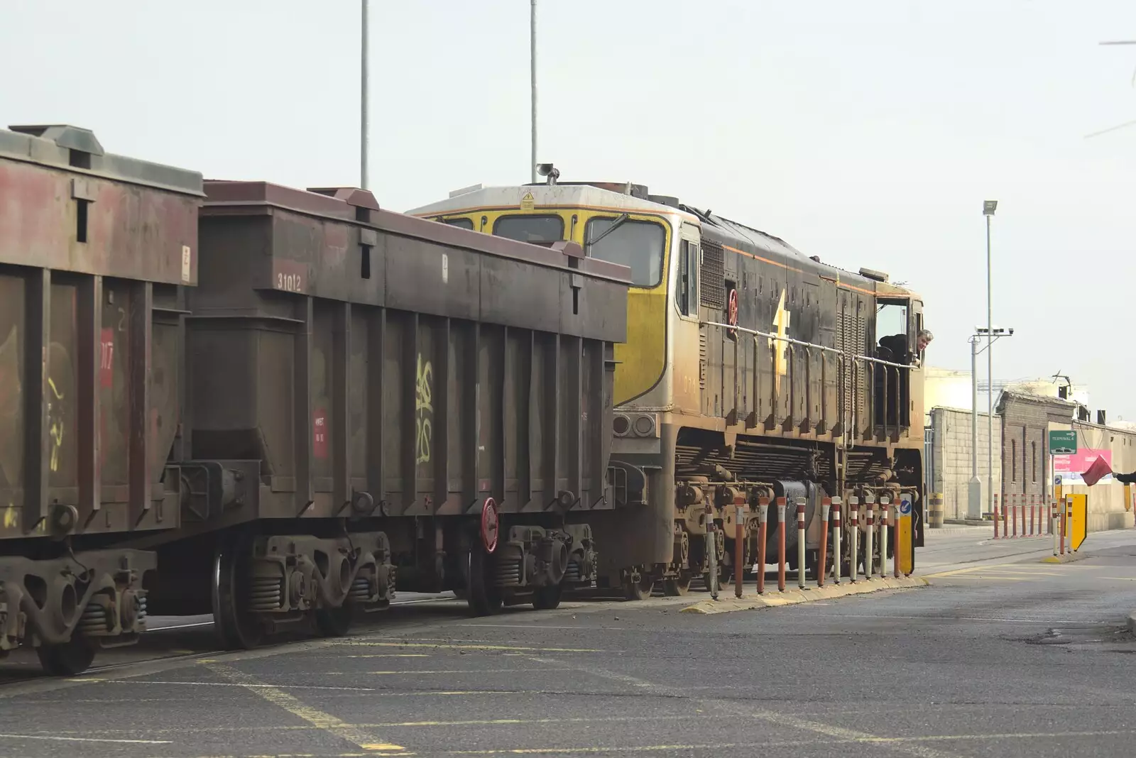 A CIE Class 141 loco rumbles across East Wall Road, from A Week in Monkstown, County Dublin, Ireland - 1st March 2011