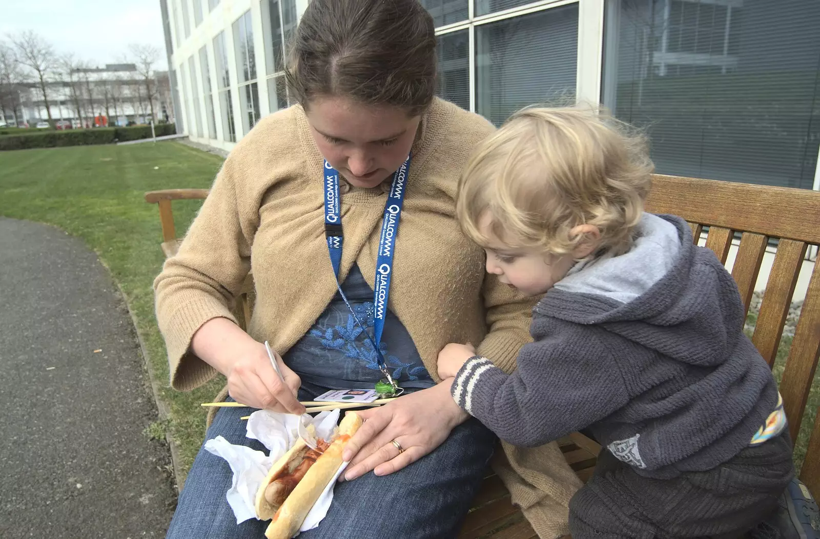 Isobel picks onions out of a hotdog for Fred, from A Week in Monkstown, County Dublin, Ireland - 1st March 2011