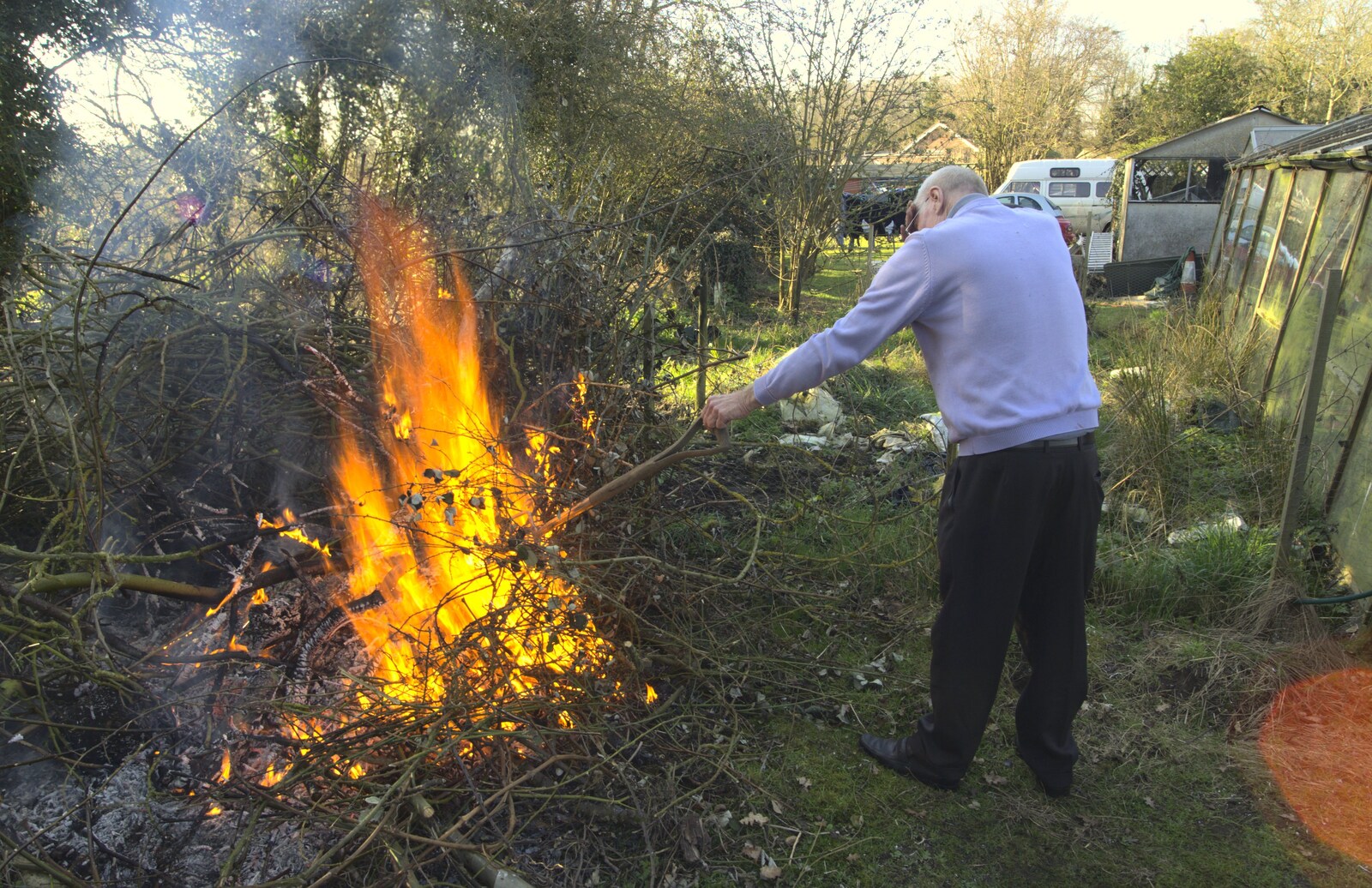 Grandad tries to set fire to a garden fork from A Trip To The Coast, Walberswick, Suffolk - 20th March 2011