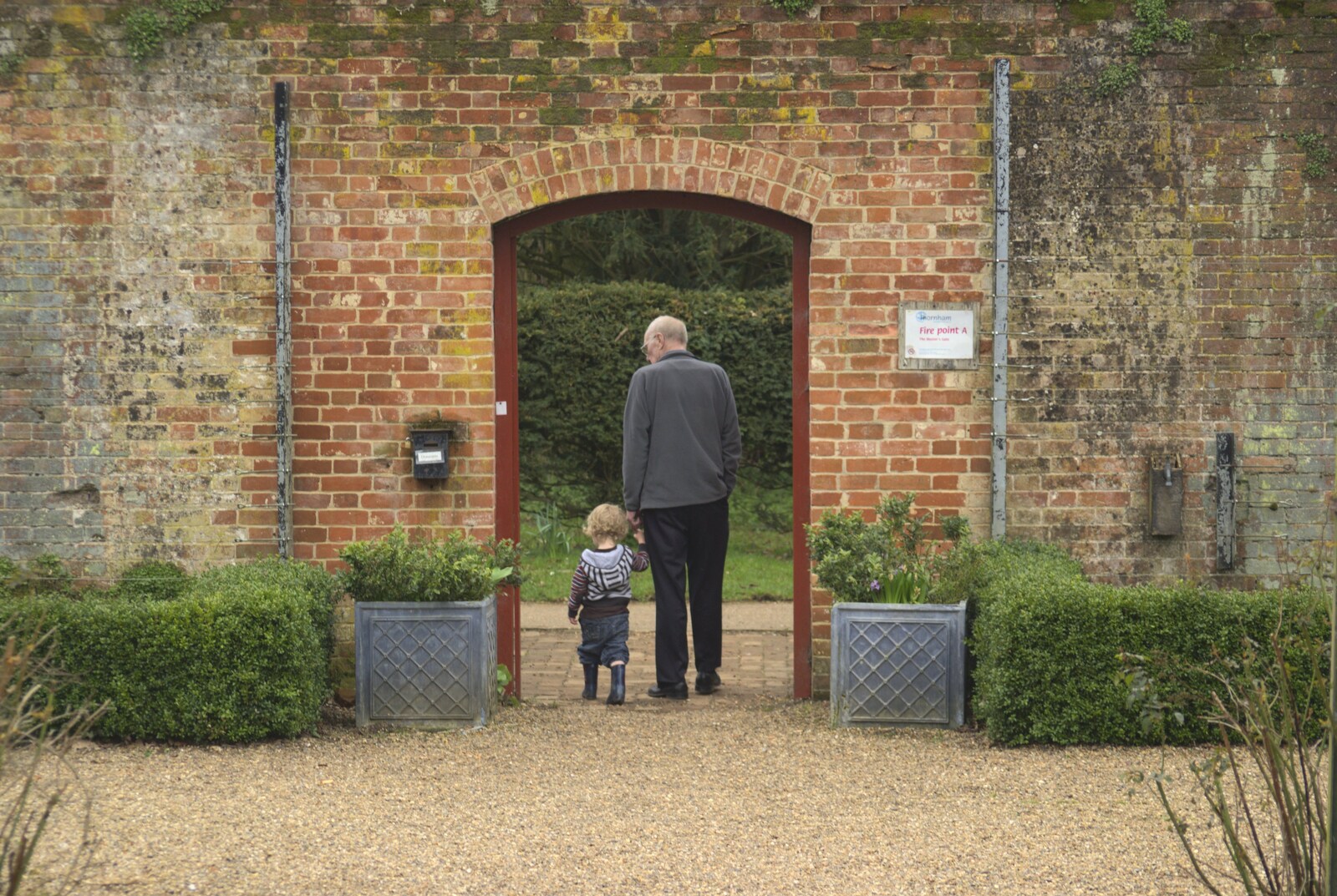 Fred and the Old Chap exit the walled garden from A Trip To The Coast, Walberswick, Suffolk - 20th March 2011