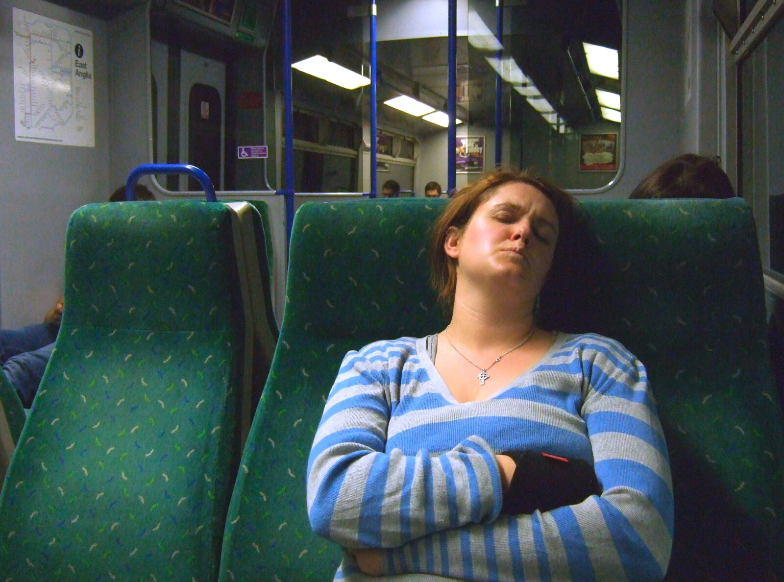 Isobel sleeps on the late train back to Colchester from Faithless at Brixton Academy, and Sis and Matt Visit, London and Brome, Suffolk - 14th April 2011