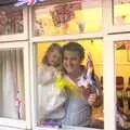 Amelia and Clive look out of the window, Charles and the Royal Wedding, Brome, Suffolk - 24th April 2011