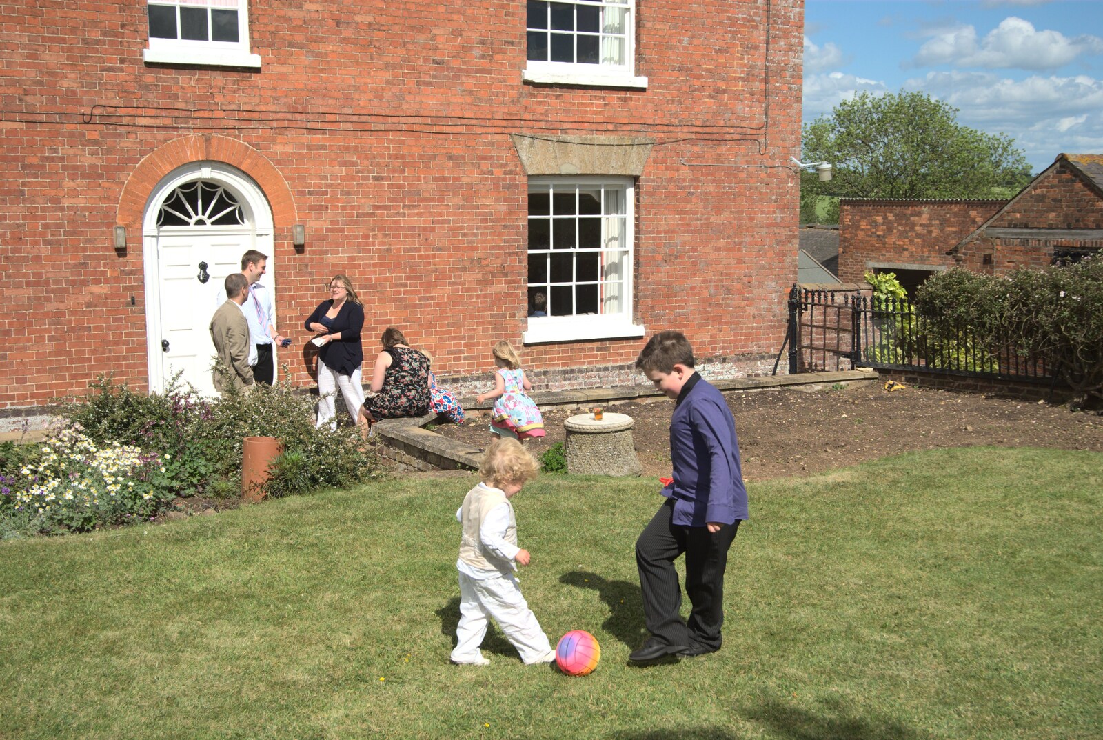 Fred plays a spot of footie from A Christening, Wilford, Northamptonshire - 22nd May 2011