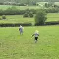 Fred chases Elizabeth over a field, A Christening, Wilford, Northamptonshire - 22nd May 2011