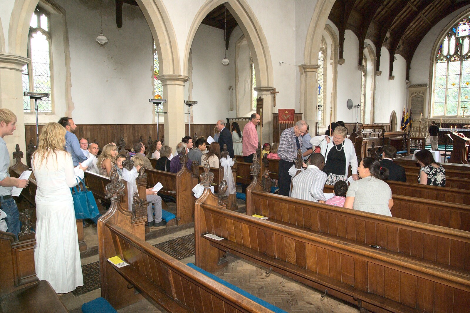 The church fills up from A Christening at St. Mary's Church, Wortham, Suffolk - 12th June 2011