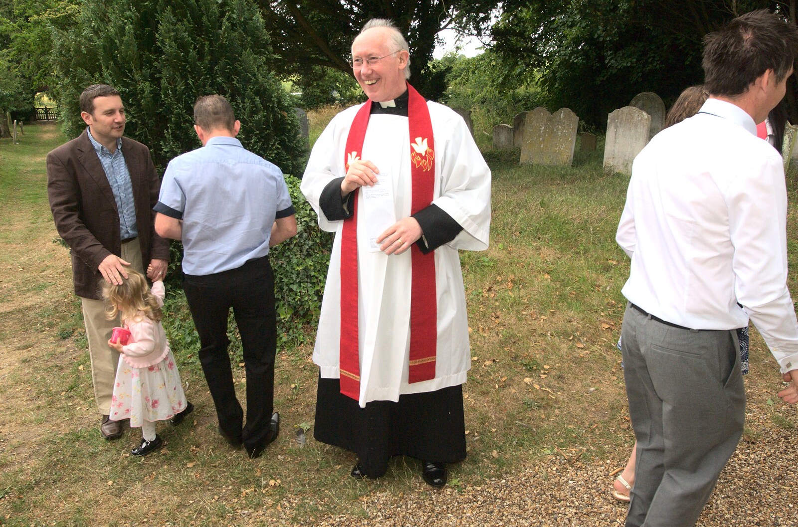 The reverend Thompson outside the church from A Christening at St. Mary's Church, Wortham, Suffolk - 12th June 2011