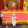 Fred bounces off the bouncy castle, A Christening at St. Mary's Church, Wortham, Suffolk - 12th June 2011